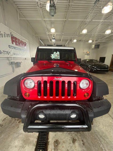 used 2011 Jeep Wrangler Unlimited car, priced at $14,250