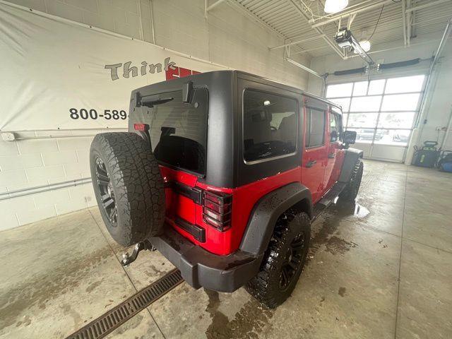 used 2011 Jeep Wrangler Unlimited car, priced at $14,250