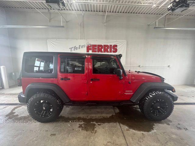 used 2011 Jeep Wrangler Unlimited car, priced at $14,250