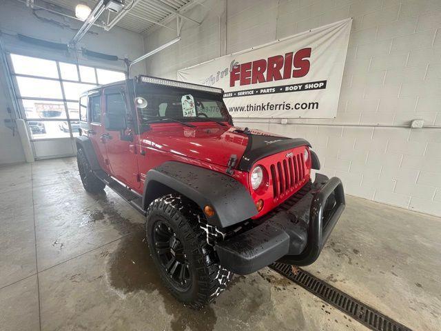 used 2011 Jeep Wrangler Unlimited car, priced at $14,250