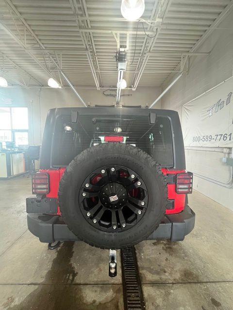 used 2011 Jeep Wrangler Unlimited car, priced at $14,250