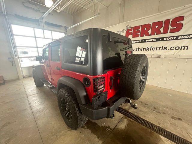 used 2011 Jeep Wrangler Unlimited car, priced at $14,250