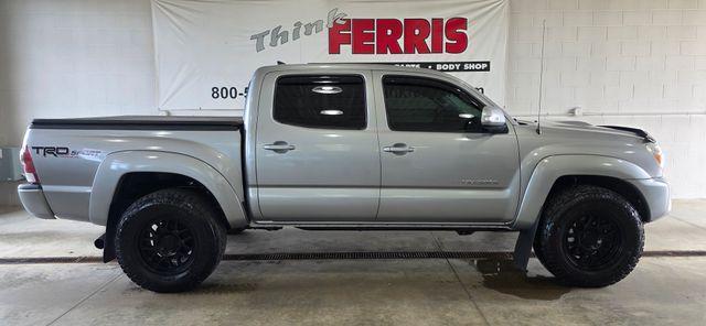 used 2015 Toyota Tacoma car, priced at $15,561