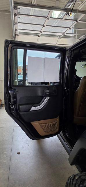 used 2011 Jeep Wrangler Unlimited car, priced at $14,286