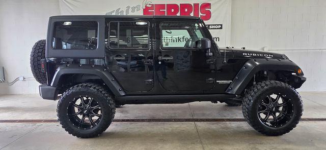 used 2011 Jeep Wrangler Unlimited car, priced at $14,286