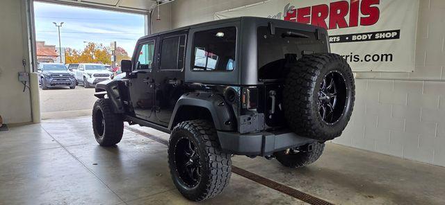 used 2011 Jeep Wrangler Unlimited car, priced at $14,286