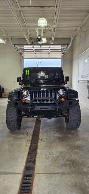 used 2011 Jeep Wrangler Unlimited car, priced at $14,286