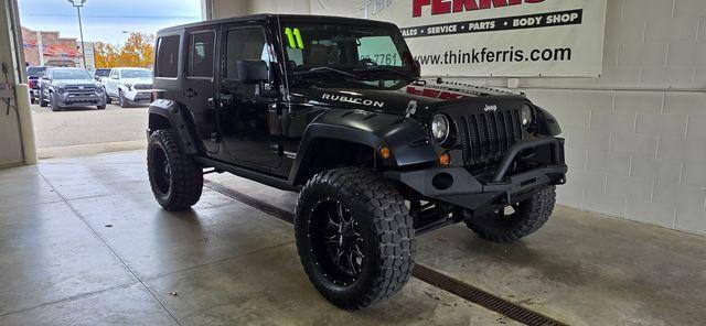 used 2011 Jeep Wrangler Unlimited car, priced at $14,286