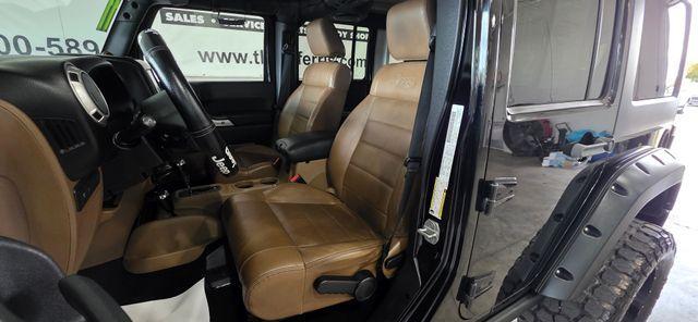 used 2011 Jeep Wrangler Unlimited car, priced at $14,286