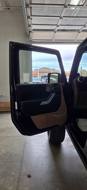 used 2011 Jeep Wrangler Unlimited car, priced at $14,286