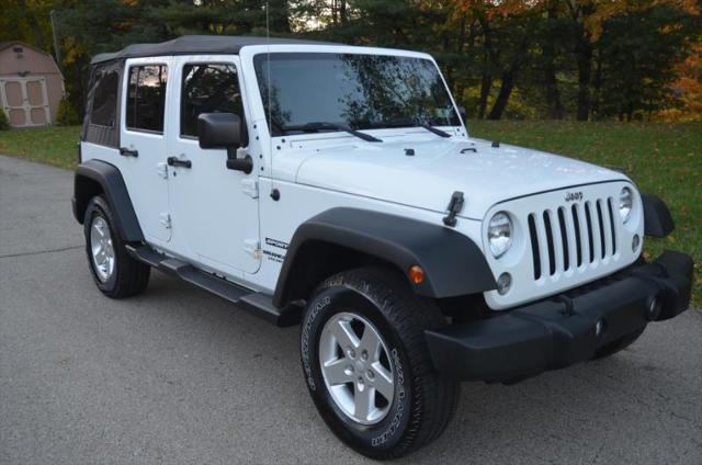 used 2015 Jeep Wrangler Unlimited car, priced at $18,988