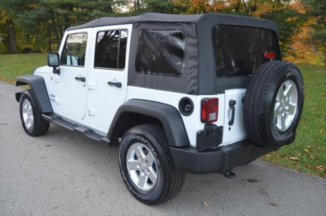 used 2015 Jeep Wrangler Unlimited car, priced at $18,988