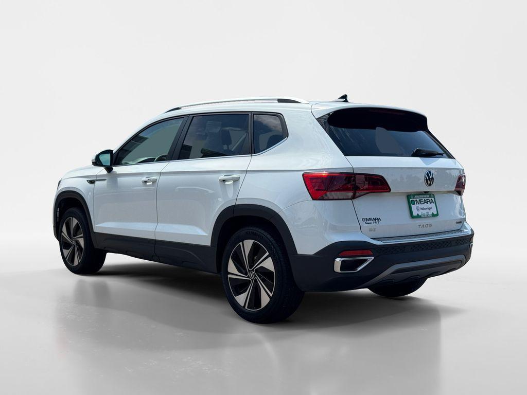 used 2023 Volkswagen Taos car, priced at $23,497