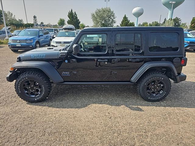 used 2023 Jeep Wrangler 4xe car, priced at $32,896