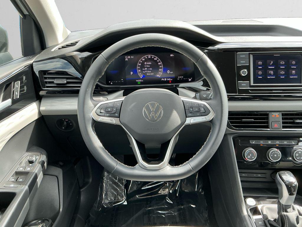 used 2024 Volkswagen Taos car, priced at $22,997