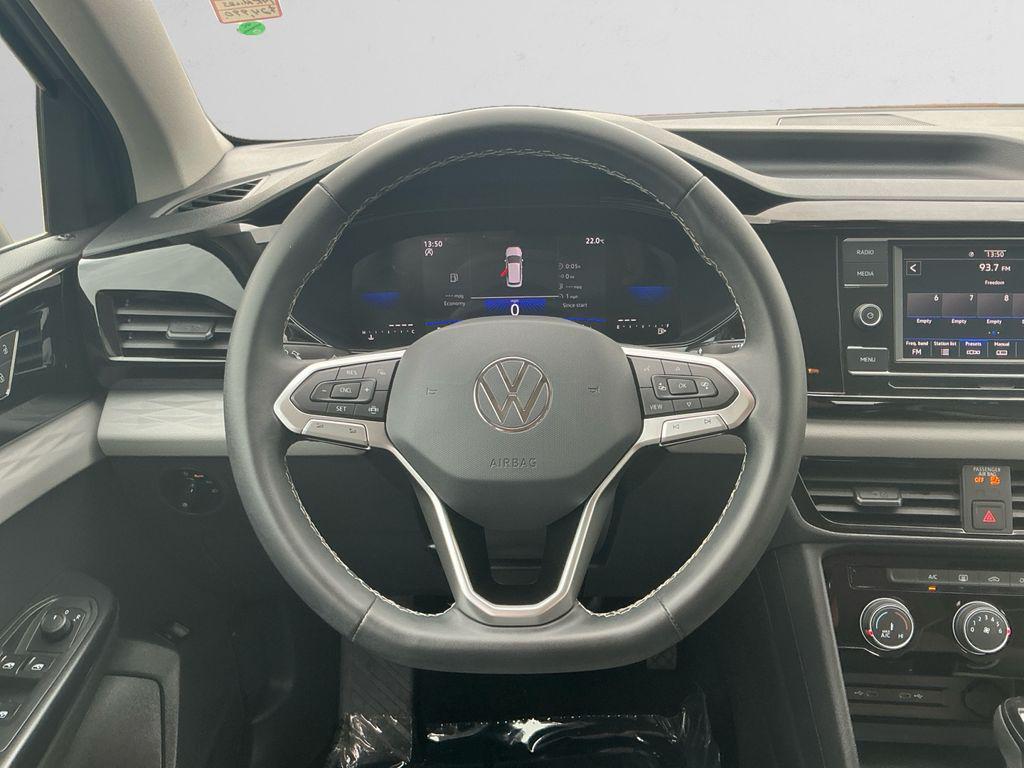 used 2023 Volkswagen Taos car, priced at $22,697