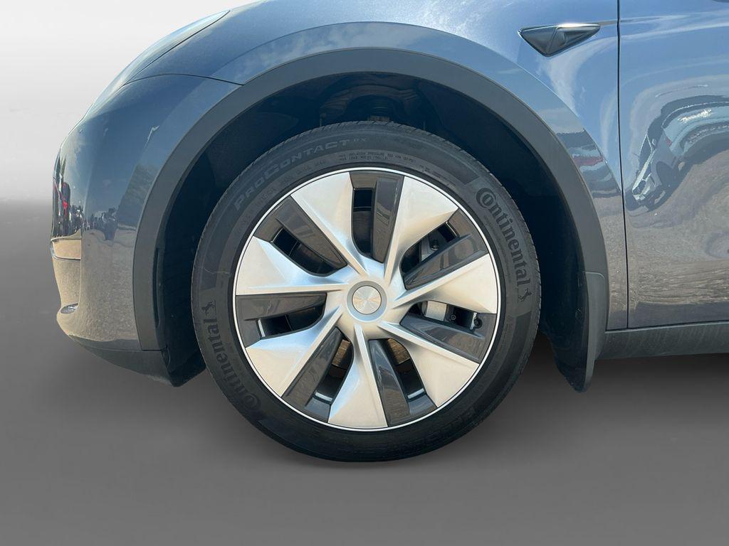 used 2023 Tesla Model Y car, priced at $30,899