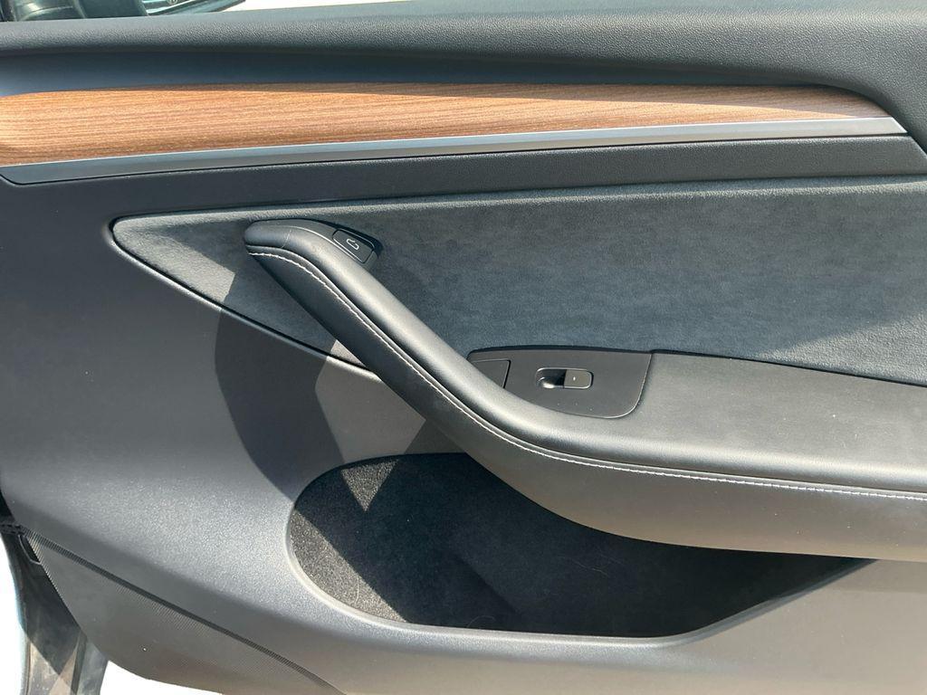 used 2023 Tesla Model Y car, priced at $30,899