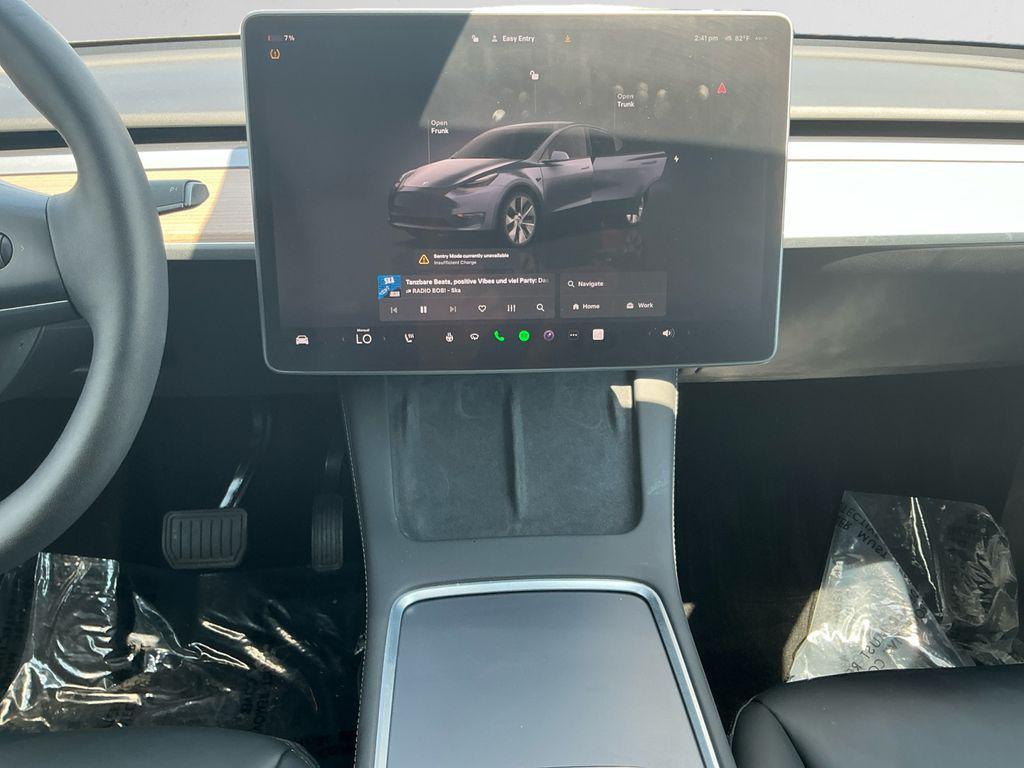 used 2023 Tesla Model Y car, priced at $30,899