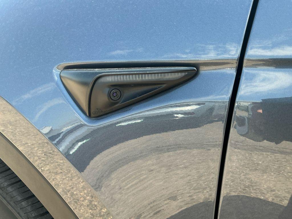 used 2023 Tesla Model Y car, priced at $30,899
