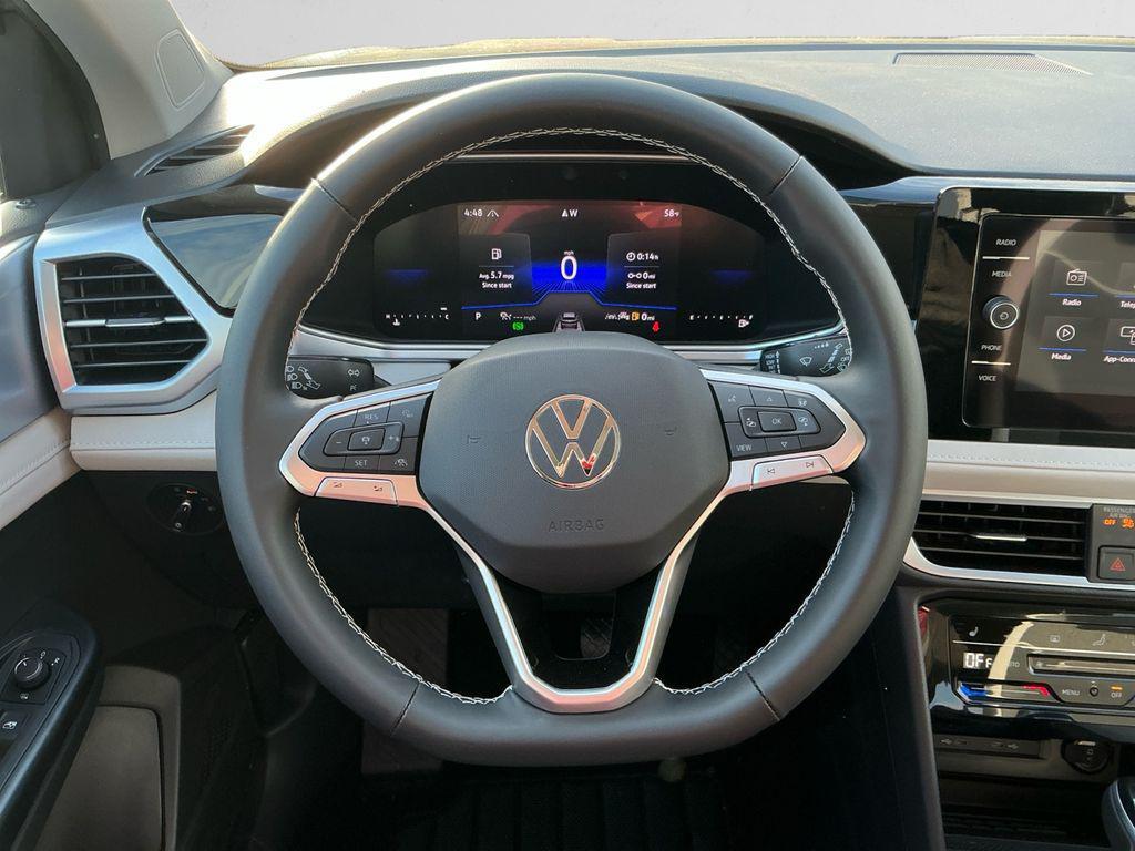new 2025 Volkswagen Taos car, priced at $32,074
