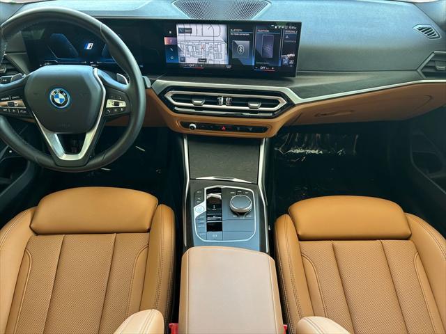 used 2023 BMW 330e car, priced at $36,826