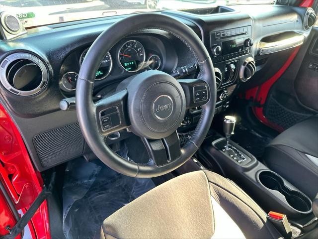 used 2014 Jeep Wrangler Unlimited car, priced at $17,690