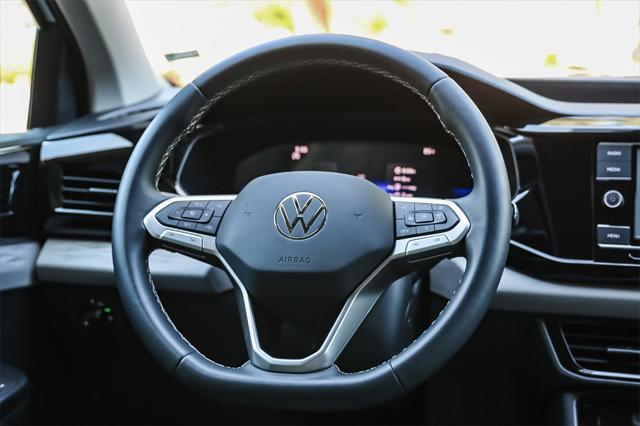 used 2023 Volkswagen Taos car, priced at $20,995