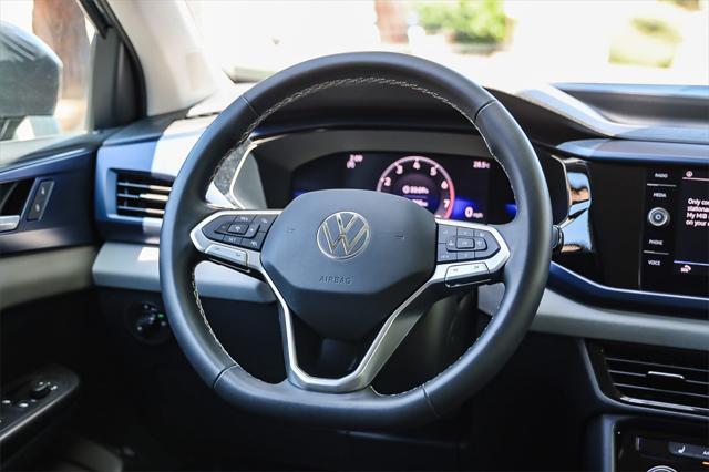 used 2023 Volkswagen Taos car, priced at $20,777