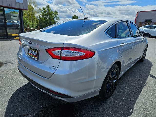 used 2016 Ford Fusion car, priced at $7,999