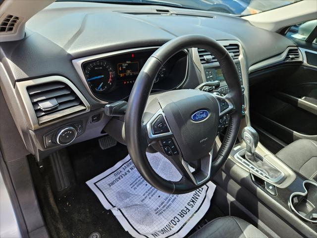 used 2016 Ford Fusion car, priced at $7,999