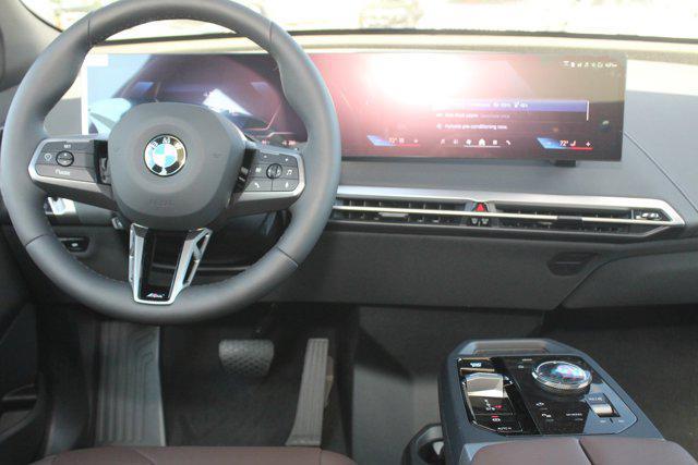 new 2025 BMW iX car, priced at $98,995