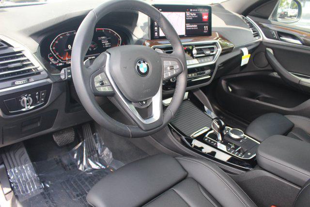 used 2024 BMW X4 car, priced at $60,345