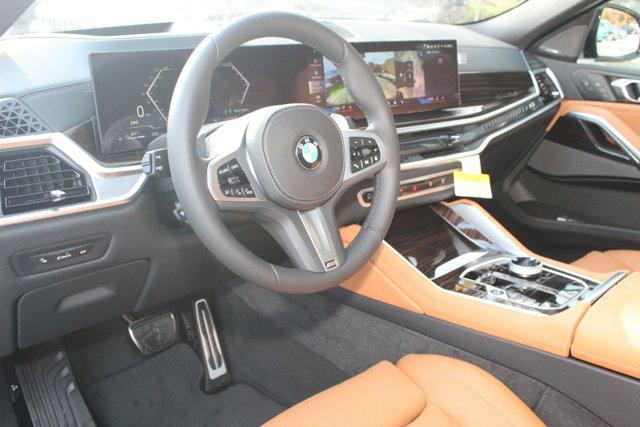 new 2025 BMW X6 car, priced at $86,925