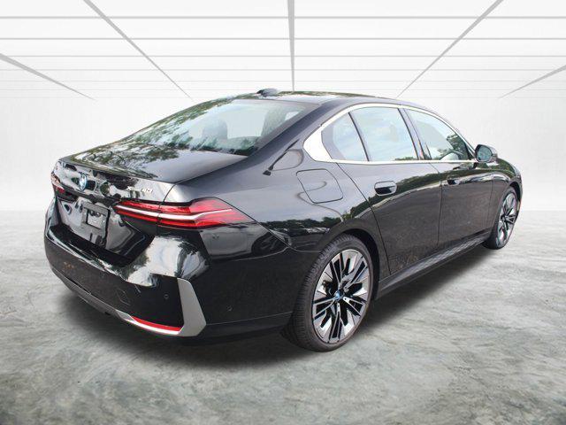 used 2025 BMW i5 car, priced at $62,648