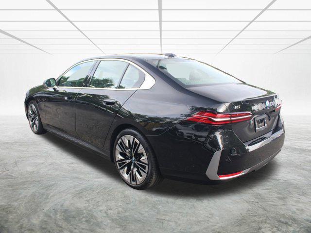 used 2025 BMW i5 car, priced at $62,648