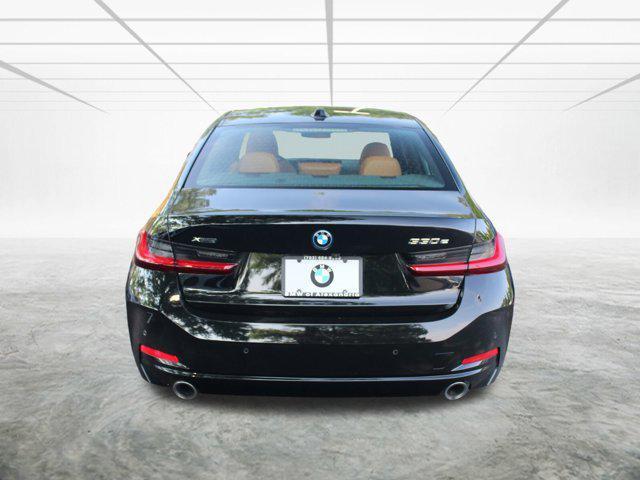 used 2023 BMW 330e car, priced at $34,998