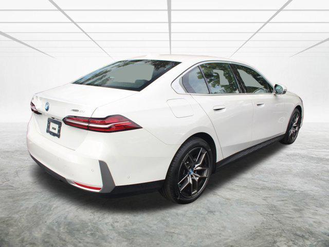 used 2025 BMW i5 car, priced at $59,008