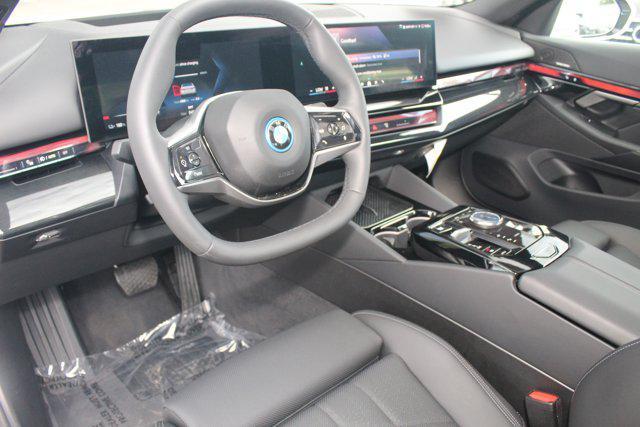 used 2025 BMW i5 car, priced at $59,008
