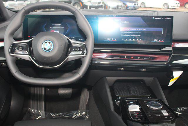 used 2025 BMW i5 car, priced at $59,008