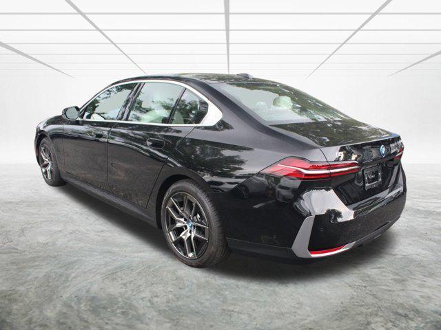 used 2025 BMW i5 car, priced at $59,928