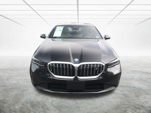 used 2025 BMW i5 car, priced at $59,928