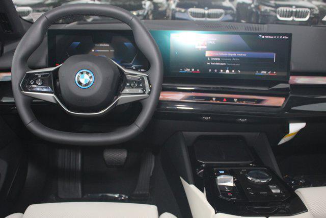 used 2025 BMW i5 car, priced at $59,928