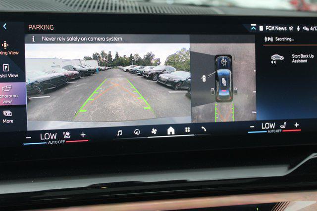 used 2025 BMW i5 car, priced at $59,928