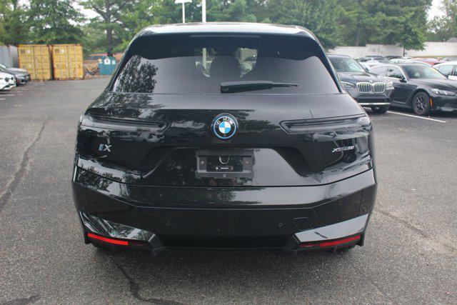 used 2024 BMW iX car, priced at $57,998