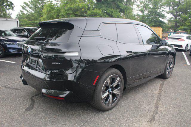 used 2024 BMW iX car, priced at $57,998