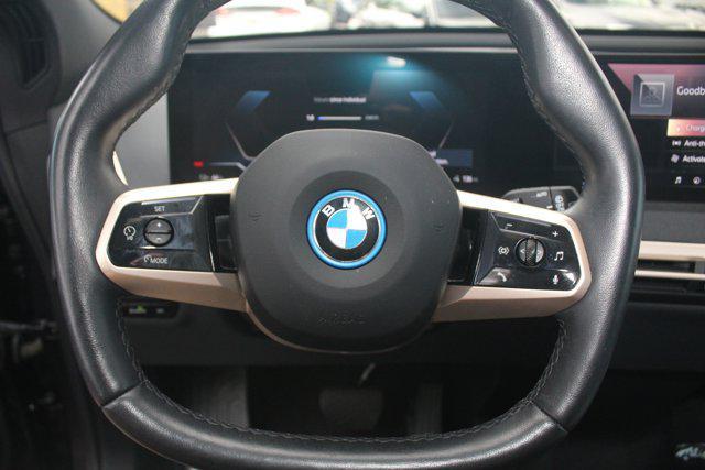 used 2024 BMW iX car, priced at $57,998