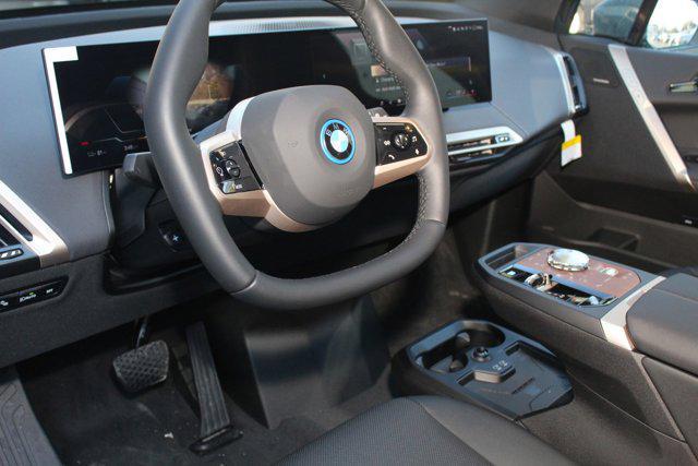 new 2025 BMW iX car, priced at $103,025