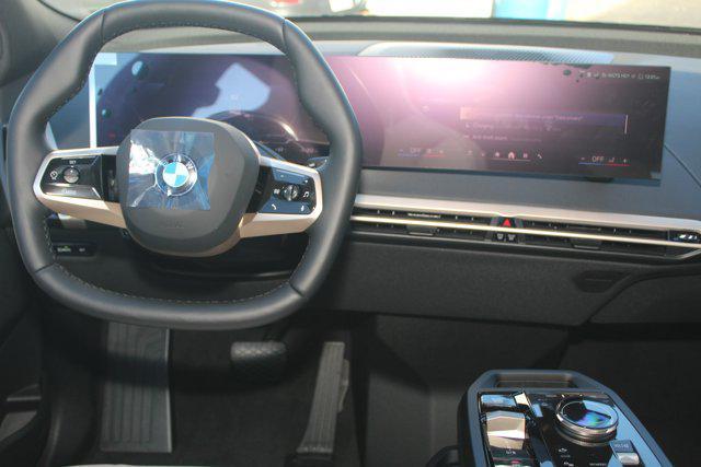 new 2026 BMW iX car, priced at $97,825