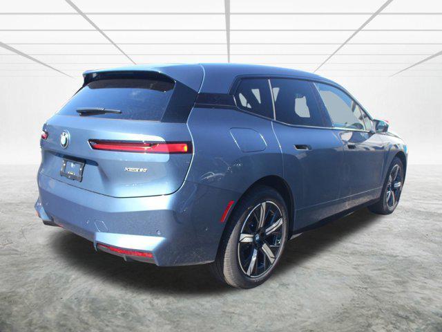 new 2026 BMW iX car, priced at $97,825
